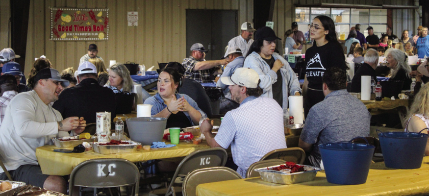 Community members chat and eat at Sealy FFA's first crawfish boil, Sunday, April 12, at the Sealy Columbus Club Pavilion. PHOTO BY SEALY NEWS | EVAN HALE