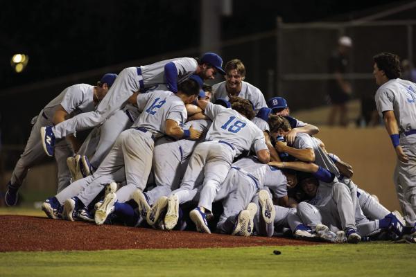 Blinn baseball players celebrate their Super Regional win over San Jacinto.