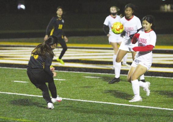 Sealy senior Valerie Villagomez lifts a shot on net during the Lady Tigers’ district contest against Columbus earlier this week on Mark A. Chapman Field at T.J. Mills Stadium. She contributed a goal and an assist to the 7-1 win. COLE McNANNA
