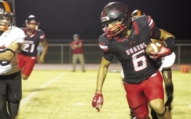 Brazos’ Alex Lara looks for running room against Van Vleck. The Cougars fell to Van Vleck in the district contest and this week will travel to Rice Consolidated. PHOTO BY WILSON CHANEY