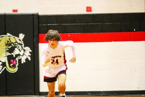 Haiden Hickman sprints down the floor on a fast break. SEALY NEWS | EVAN HALE