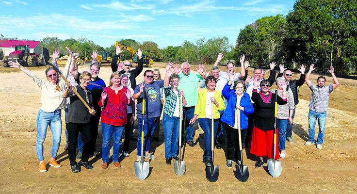 Members of the Sealy Ministerial Alliance gathered for a ribbon cutting on a new location for the Sealy Christian Pantry. PHOTO BY ABENEZER YONAS
