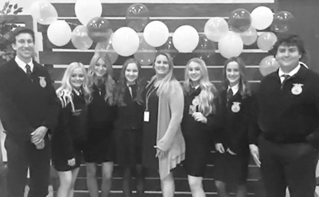 President Mauricio Cano, Chaplain Kennedy Thumann, Secretary Chesney Johnston, Treasurer Skyler Pyka, FFA teacher Mrs. Summer Neumann, Reporter Kylee Neumann, Vice President Micah Hames, and Sentinel Neil Johnston were celebrated at Faith Academy’s FFA Banquet May 7 at the Faith Academy Event Center. CONTRIBUTED PHOTO