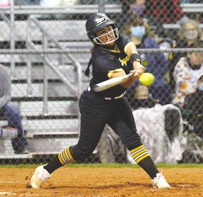 Sealy senior Kayla Camacho connects with a pitch during the Lady Tigers’ non-district game against Legacy at home March 9. Camacho was named the District 24-4A Offensive MVP. COLE McNANNA