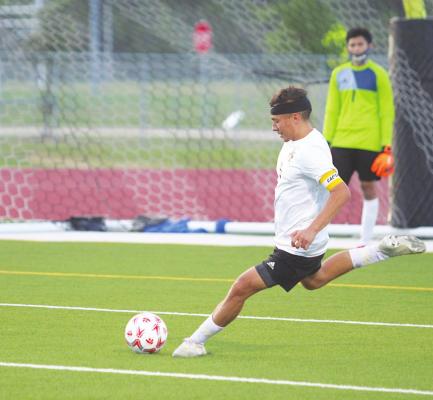 Tiger senior Angel Guerrero lines up a kick during the second half of the April 6 regional semifinal game against Splendora at Cy Park High School. Guerrero was one of Sealy’s four second-team all-district honorees.