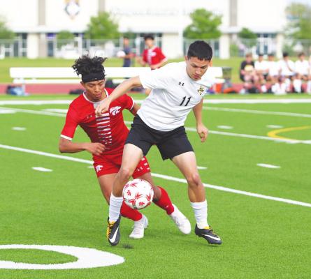 Sealy senior Ricky Avila battles for a ball with a Splendora defender during the Tigers’ regional semifinal playoff game at Cy Park High School April 6. Avila was named the District 20 co-offensive MVP. PHOTOS BY COLE McNANNA