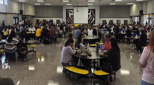 Sealy ISD Junior High Cafeteria filled with teachers and staff enjoying the luncheon.
