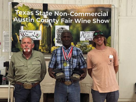 L to R – James Brooks (Gulf Coast Winegrowers President), Archie Davis (Austin County Overall Grand Champion), Joe Klenke (Wine Show Chairman)