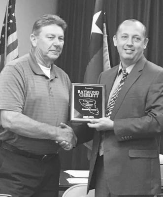 Judge Tim Lapham presents award to Raymond Chislett. COURTESY PHOTO