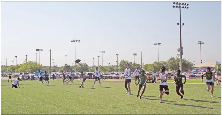 Sealy Tigers senior wide receiver Haden Wernecke (14) stares down a pass from quarterback D’vonne Hmielewski against Fort Bend Christian Academy at the seven-on-seven state tournament at Veterans Park and Athletic Complex in College Station. JASON MANAGO-GRAVES