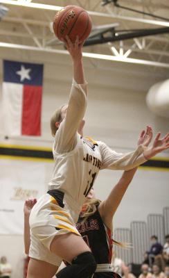 Sealy junior Evelyn Harrington goes up for a bucket during a non-district game at home against the Gonzales Apaches on Dec. 7, 2020. Harrington led the Lady Tigers in scoring through 11 non-district games with an average of 15.3 points per game. Cole McNanna