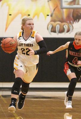 Sealy senior Megan Schaaf advances the ball up court in a non-district matchup with Gonzales at home on Dec. 7, 2020. In 11 non-district games, Schaaf racked up 50 total points, 40 rebounds, 14 steals and 11 assists. Photos by Cole McNanna