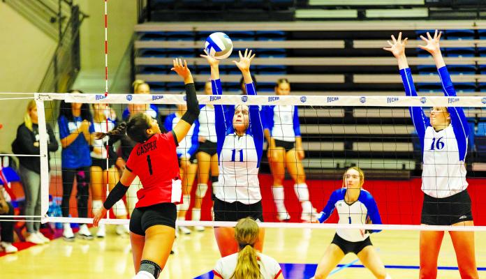 Elizabeth Tyner (11) goes up for a block during the consolation game. COURTESY PHOTO