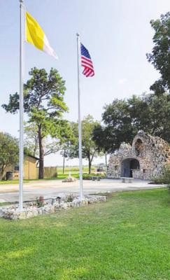 TOP LEFT: New flag poles that fly the Vatican and American flags were part of Sealy High School senior Cameron Eschenburg’s Eagle Scout project at St. Mary’s Church in Frydek near the Grotto stone.
