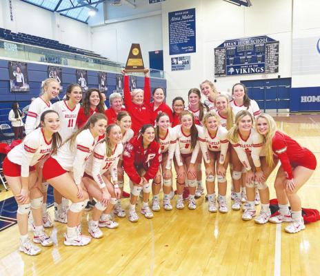 The Region III Champion Bellville Brahmanettes hoist the trophy after its 3-1 win over China Spring at Bryan High School Nov. 13. Bellville will compete in the state semifinal Thursday evening in Garland. CONTRIBUTED PHOTO