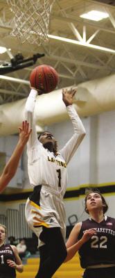 Sealy sophomore Taniah Coleman goes up for a layup during the Lady Tigers’ non-district game against East Bernard Dec. 10 at home. PHOTOS BY COLE McNANNA