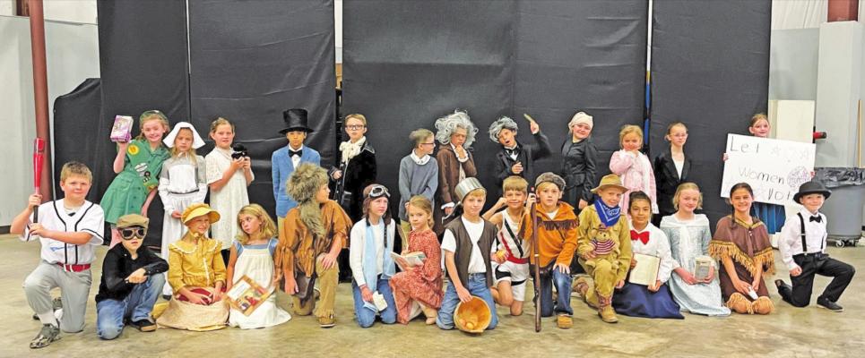 Third graders hold walk-through