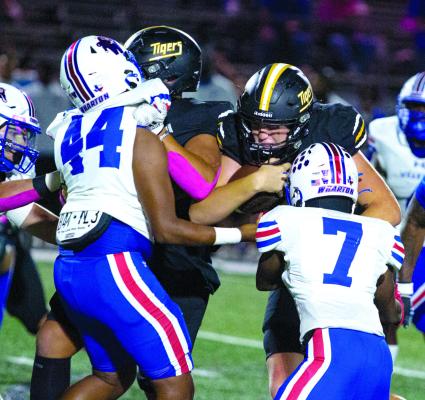Sealy’s Reid Miller looks for running room against Wharton last Friday night. PHOTOS BY ABENEZER YONAS