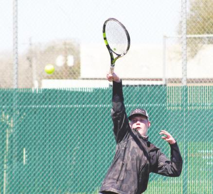 Sealy’s Hayden Havel returns a shot during a host quad-match March 3. Havel and Jacob Gajewski competed in the boys’ doubles bracket at Bellville’s District 24-4A Championships last week. COLE McNANNA