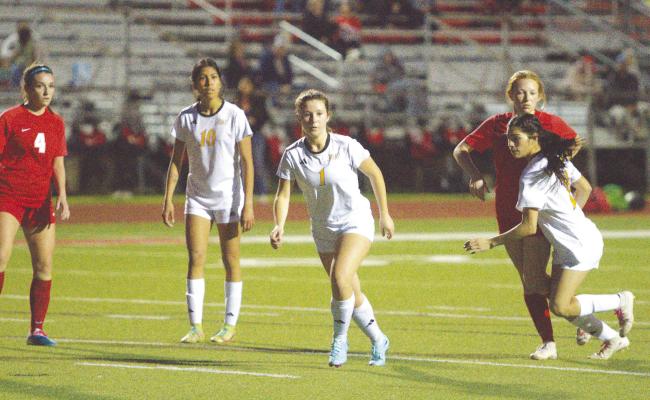 The Lady Tigers rush the box during a set piece hopping to catch the Brahmas off guard. PHOTOS BY ABENEZER YONAS