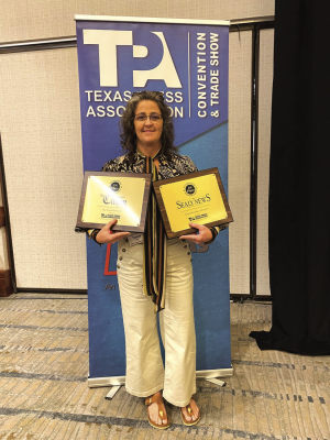 Sealy News Growth and Development Manager Tressa Alley with some of the awards presented at the annual Texas Press Association Conference and Awards Ceremony Saturday, June 20. SEALY NEWS| ALESIA WOOLRIDGE