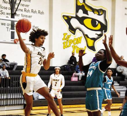 AJ Cepon saves the ball from going out of bounds by passing it to an open teammate.