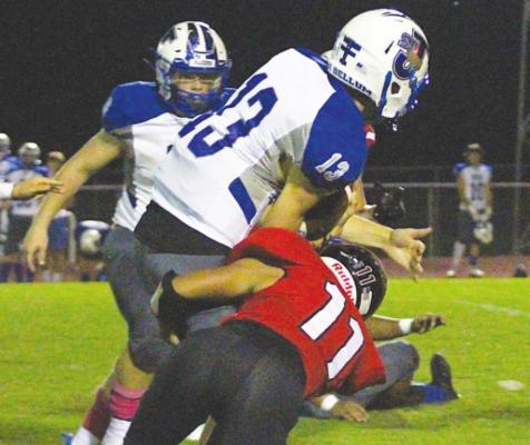 Brazos senior Bryan Maldonado collides with St. Joseph quarterback Jackson Stefka for a tackle during the Cougars’ homecoming game against the Flyers Oct. 1. Maldonado was named the co-utility player of the year for District 14-3A and was on the second-team all-district defense. COLE McNANNA