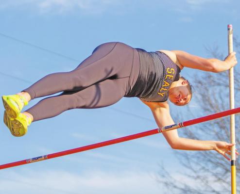 Sealy senior Breanna Brandes clears a pole vault attempt during the 37th annual Sammy Dierschke Relays at T.J. Mills Stadium Thursday, March 10. Brandes won the event to help the Lady Tigers win the team championship. COLE McNANNA