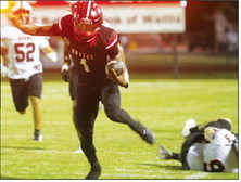 Jarvse Dickerson slips past a tackle and runs down the sideline for a touchdown on Friday, Sept. 19, against Schulenburg. SEALY NEWS | EVAN HALE