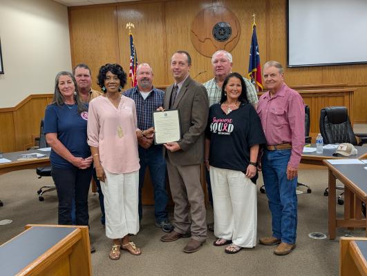 (left to right) Tammy Wendel (Austin County EMS/FCS Advisory Board Member), Leroy Cerny (AC Commissioner Pct 3), Michelle Wright (Distinguished Agent, Texas A&amp;M AgriLife Extension Service of Austin County-Family &amp; Community Health), Chip Reed (AC Commissioner Pct 4), Tim Lapham (AC Judge), Mark Lamp (AC Commissioner Pct 1), Dianna Grigar-Grobe (Chief of Staff, AC Judge’s Office), Bobby Rinn (AC Commissioner Pct 2).