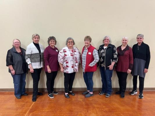 Members present, left to right, Jessie Kokemor, Carolyn Balke, JoAnn Reichle, Doris Glenewinkel, Gaye Farr, Barney Zimmerman, Pat Allee and Joan Buenger.