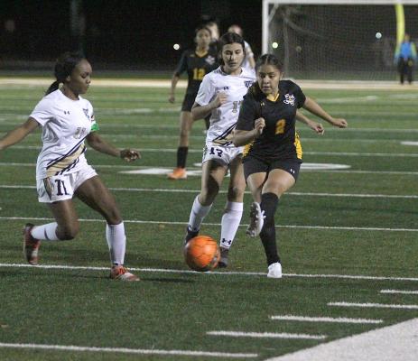 Sealy senior Janette Lozano sends a ball into the offensive end in the Lady Tigers’ non-district tilt against Giddings at home on Jan. 5. (Cole McNanna/Sealy News)