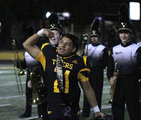 Oswaldo Rodriguez flexes as his name was called to announce him as Homecoming King at last Friday’s home football game against Stafford at T.J. Mills Stadium in Sealy. COLE McNANNA