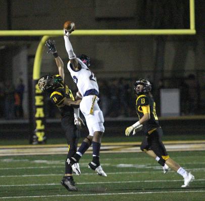 Sealy junior Haden Wernecke leaps to break up a pass intended for La Marque’s Dylan Thomas in the first half of the regular-season finale at T.J. Mills Stadium Friday night. COLE McNANNA