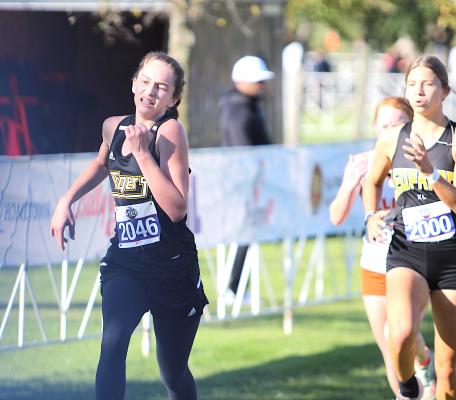 Lady Tiger sophomore Annabelle Williams finishes her state race in Round Rock Saturday morning. COLE McNANNA
