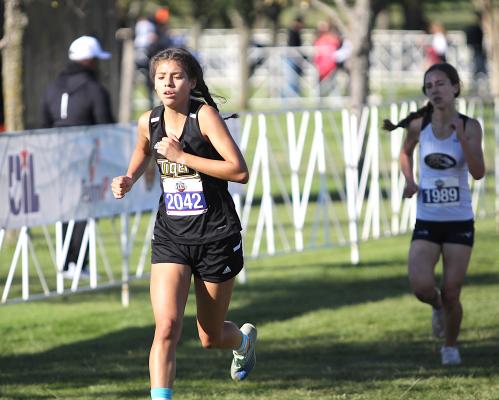 Lady Tiger sophomore Allyson Guerrero eyes the finish line during Saturday morning's State Championship meet at Old Settlers Park in Round Rock. COLE McNANNA