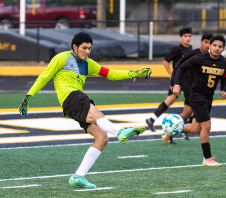 Sealy senior Brayan Aviles clears a ball after making a save in the Tigers’ District 24-4A contest against Navasota at home March 4. Aviles was among four Sealy athletes to land on the second-team all-district. COLE McNANNA