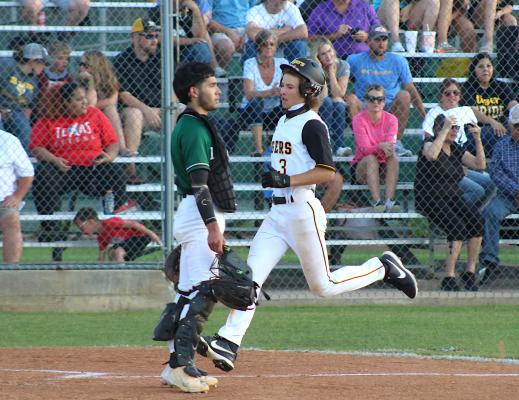 Tiger junior Gage Grigar cruises across the plate to score one of 15 Sealy runs in its bi-district win over Mickey Leland Prep at Aubrey “Mutt” Stuessel Stadium last Friday. COLE McNANNA