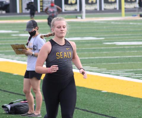 Lady Tiger senior Madison Manak runs during Sealy’s Sammy Dierschke Relays March 11 at T.J. Mills Stadium in Sealy. Manak grabbed third-place finishes in the 1600- and 3200-meter runs at the Archie Seals Relays last week in Bellville. (Cole McNanna/Sealy News)