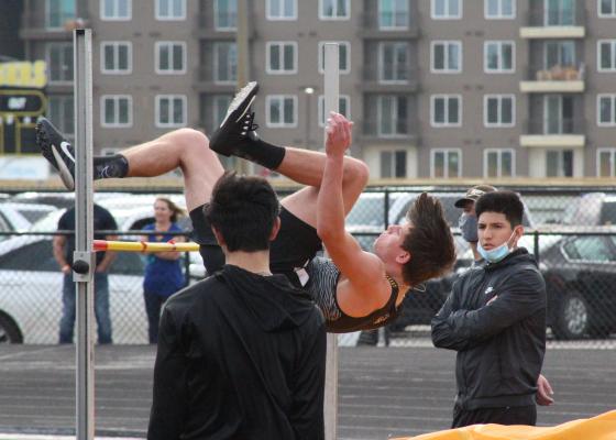 Tiger senior Lane Holley clears a high jump attempt on the infield of Mark A. Chapman Field during the annual Sammy Dierschke Relays last Thursday in Sealy. (Cole McNanna/Sealy News)