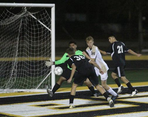 Sealy sophomore Tanner Ellis (36) puts a header on net in the Tigers’ non-district finale against Giddings on Jan. 18 at T.J. Mills Stadium in Sealy. (Cole McNanna/Sealy News)