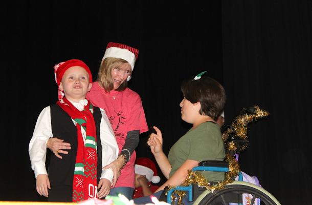 Jordan and Rylee interact as part of their performance to the song Box of Rocks during the Sealy ISD Chance to Dance Holiday Recital at Sealy Junior High School last Tuesday. PHOTOS BY COLE McNANNA