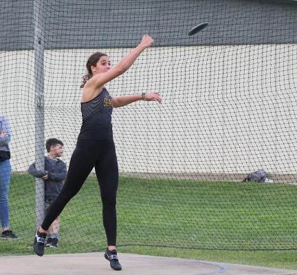Sealy senior Ally Dickens launches a discus throw on the back fields of Sealy Junior High during the annual Sammy Dierschke Relays last Thursday. (Cole McNanna/Sealy News)
