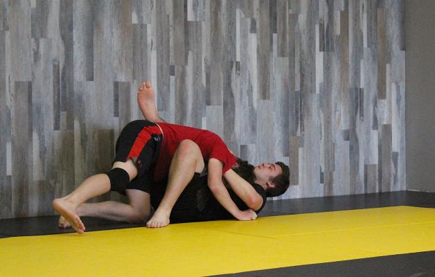Luke Richards and Justin Hart spar at the Sealy Brazilian Jiu-Jitsu dojo that officially opened in December at the Outlet Center Mall in Sealy. Call 281-785-9000 or email sealybjj@gmail.com for more information. (Cole McNanna/Sealy News)