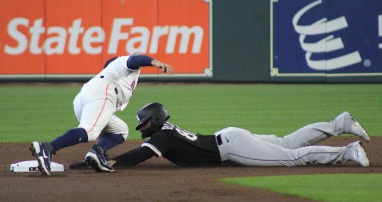 Astros shortstop Carlos Correa applies the tag on Chicago’s Luis Robert to cut down the stolen base attempt in the second attempt of Game 1 of the ALDS at Minute Maid Park in Houston. COLE McNANNA