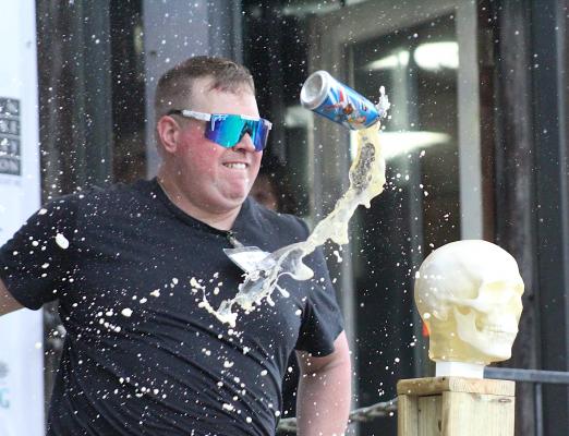 But first, beer. Jo Smith of Silver Anvil Blades prefaced his first slice into a ballistic model of a head with the decimation of a beer can during a live demonstration at last weekend’s Texas Select from Forged in Fire event at Phenix Knives in downtown Bellville. (Cole McNanna/Sealy News)
