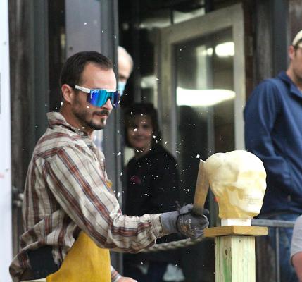 Alex Regusci fractures the “skull” of a ballistic model of a head during a live demonstration at Phenix Knives’ Texas Select from Forged in Fire event in downtown Bellville. (Cole McNanna/Sealy News)