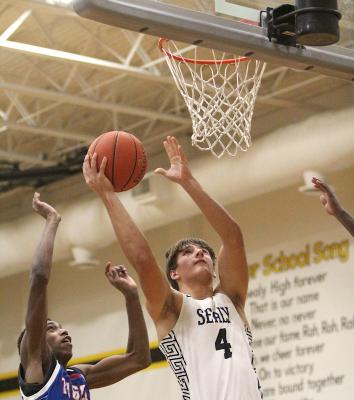 Sealy senior Connor Krenek supplied this bucket as part of a 5-point performance that helped the host Tigers down Wharton by four points last Saturday afternoon at home. (Cole McNanna/Sealy News)