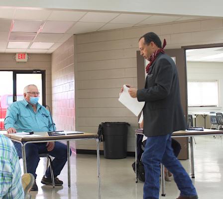 Austin County Judge Tim Lapham approaches the podium to address Sealy City Council during a March 30 special meeting at the Hill Center. (Karen Lopez/Sealy News) 
