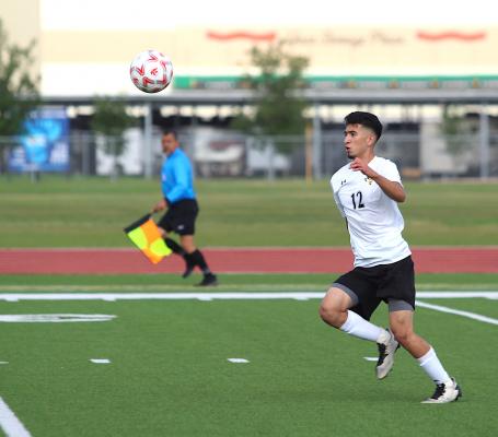 Tiger sophomore Amador Lopez chases after a loose ball during the first half of Sealy’s fourth-round playoff game against Splendora at Cy Park High School April 6, 2021. Lopez is among the returning starters from last year’s squad who will open the season this weekend in Giddings. COLE McNANNA
